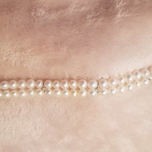 Double Strand Pearl Bracelet with diamond bridge stations and 14k gold clasp